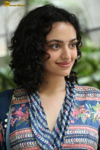 Actress malvika nair photoshoot in salwar dress and curly hair