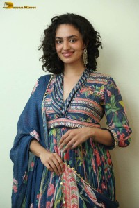 Actress malvika nair photoshoot in salwar dress and curly hair