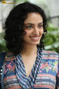 Actress malvika nair photoshoot in salwar dress and curly hair