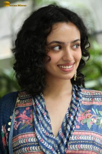 Actress malvika nair photoshoot in salwar dress and curly hair
