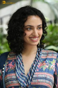 Actress malvika nair photoshoot in salwar dress and curly hair