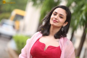 indian actress malvika nair cute looks in a red dress