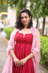 indian actress malvika nair cute looks in a red dress