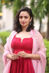 indian actress malvika nair cute looks in a red dress