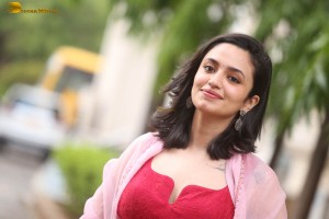 indian actress malvika nair cute looks in a red dress