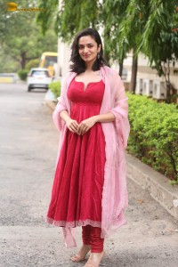indian actress malvika nair cute looks in a red dress