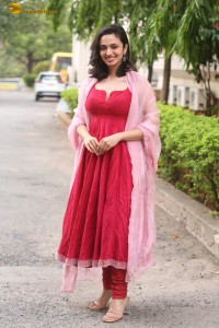 indian actress malvika nair cute looks in a red dress