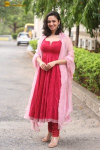 indian actress malvika nair cute looks in a red dress