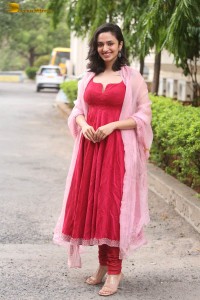 indian actress malvika nair cute looks in a red dress