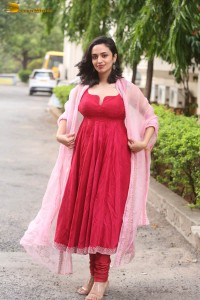 indian actress malvika nair cute looks in a red dress