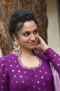 indian actress malvika nair in a dark pink salwar kameez dress