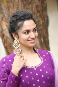 indian actress malvika nair in a dark pink salwar kameez dress