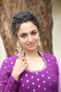 indian actress malvika nair in a dark pink salwar kameez dress