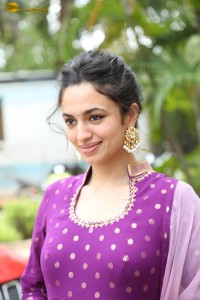 indian actress malvika nair in a dark pink salwar kameez dress