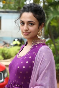 indian actress malvika nair in a dark pink salwar kameez dress