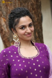 indian actress malvika nair in a dark pink salwar kameez dress