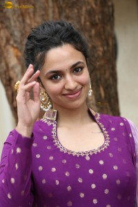 indian actress malvika nair in a dark pink salwar kameez dress