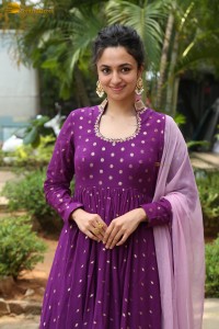 indian actress malvika nair in a dark pink salwar kameez dress