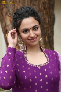 indian actress malvika nair in a dark pink salwar kameez dress