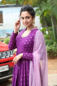 indian actress malvika nair in a dark pink salwar kameez dress