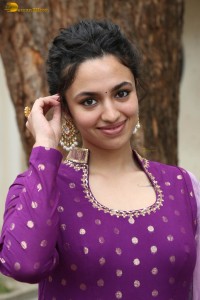 indian actress malvika nair in a dark pink salwar kameez dress