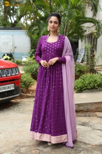 indian actress malvika nair in a dark pink salwar kameez dress