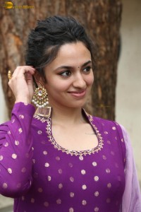 indian actress malvika nair in a dark pink salwar kameez dress