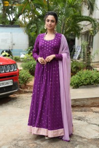 indian actress malvika nair in a dark pink salwar kameez dress