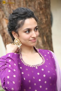 indian actress malvika nair in a dark pink salwar kameez dress