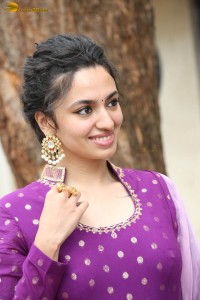 indian actress malvika nair in a dark pink salwar kameez dress