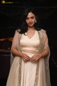 actress malvika nair lovely in a white dress