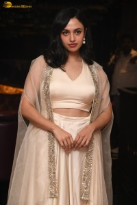 actress malvika nair lovely in a white dress