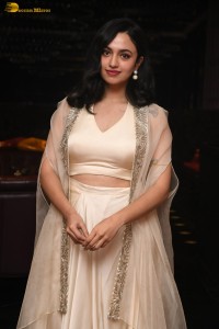 actress malvika nair lovely in a white dress