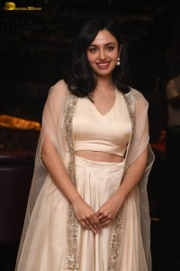 actress malvika nair lovely in a white dress