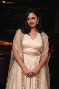 actress malvika nair lovely in a white dress