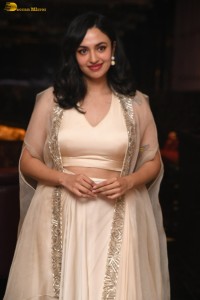 actress malvika nair lovely in a white dress