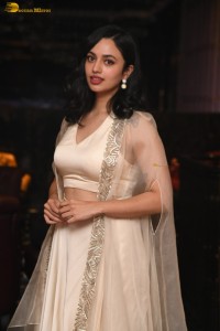 actress malvika nair lovely in a white dress