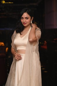 actress malvika nair lovely in a white dress