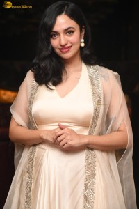 actress malvika nair lovely in a white dress