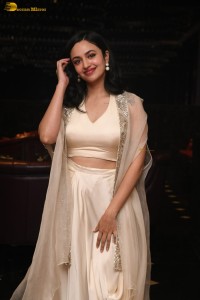 actress malvika nair lovely in a white dress