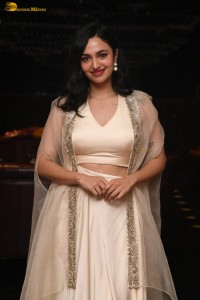 actress malvika nair lovely in a white dress
