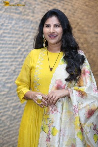 Singer Mangli in a yellow salwar dress