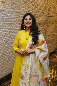 Singer Mangli in a yellow salwar dress
