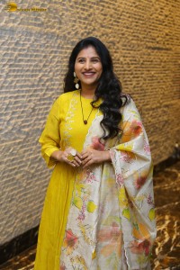 Singer Mangli in a yellow salwar dress
