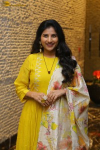 Singer Mangli in a yellow salwar dress