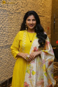 Singer Mangli in a yellow salwar dress