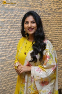 Singer Mangli in a yellow salwar dress