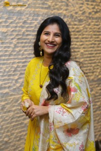 Singer Mangli in a yellow salwar dress
