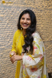 Singer Mangli in a yellow salwar dress