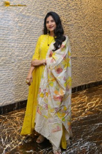 Singer Mangli in a yellow salwar dress